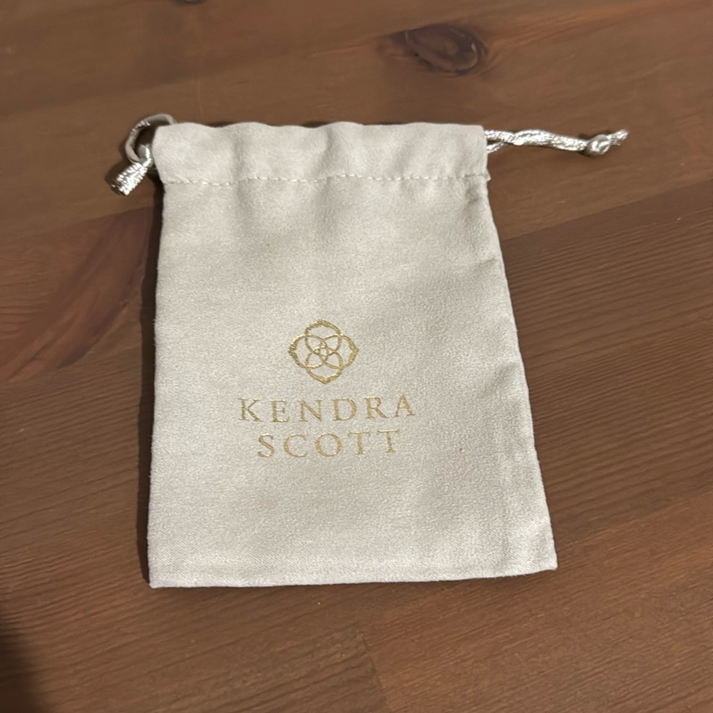 Kendra Scott small jewelry pouch in cream colored suede